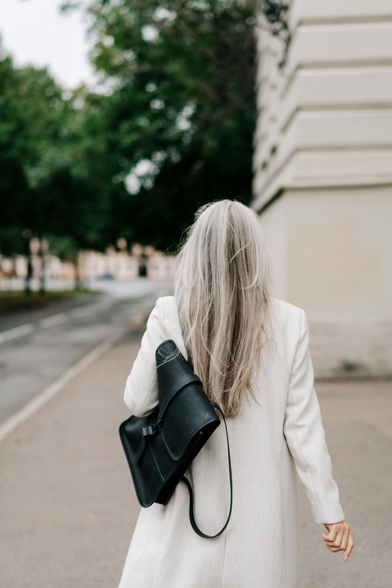 Confident woman walking alone after divorce